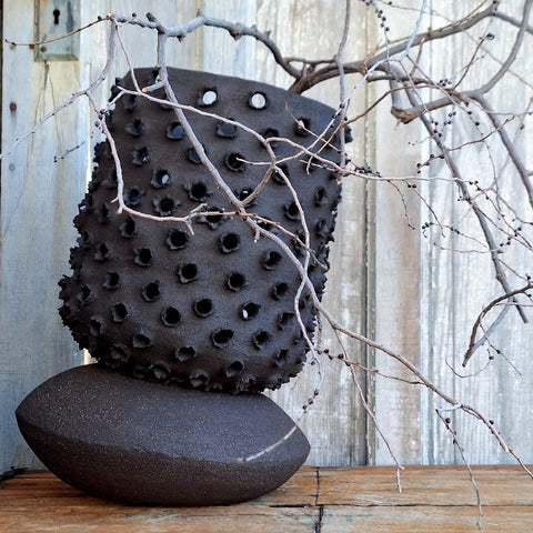 Ceramic vessel and pillow